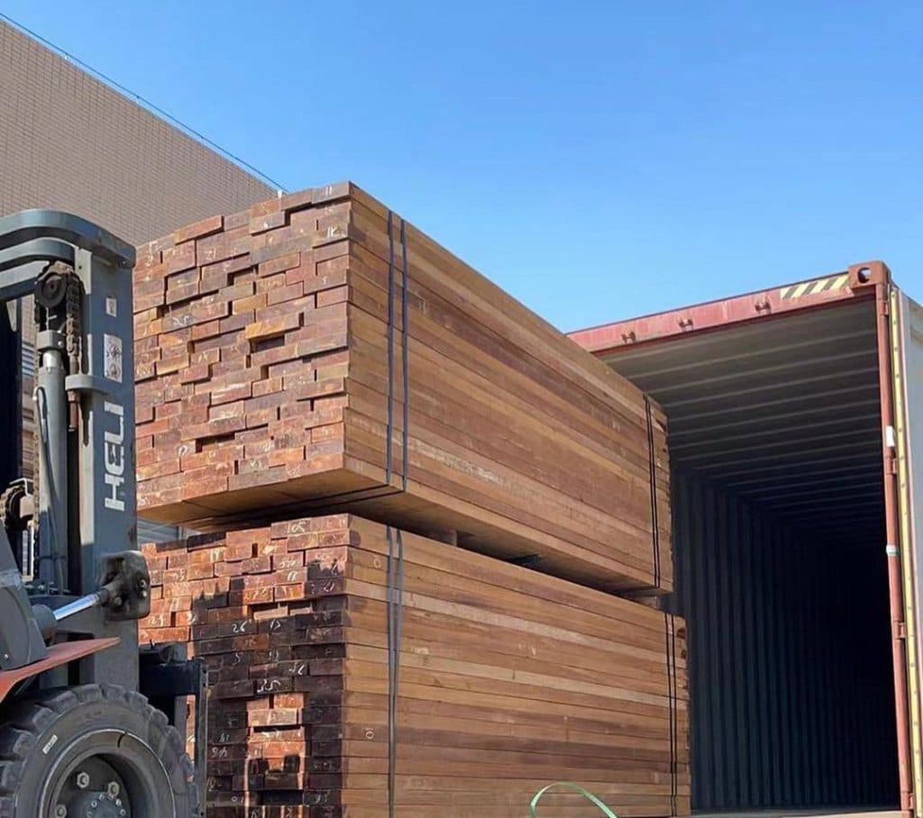 Bahar Timber lumber being loaded into a shipping container
